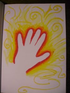 A powerful hand glows.